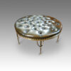Circular leather stool on brass stand
