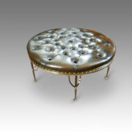 Circular leather stool on brass stand