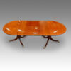 Inlaid round ended twin pillar dining table