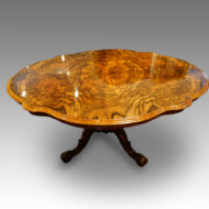 Shaoed Victorian walnut table