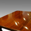 Antique extending dining table in mahogany