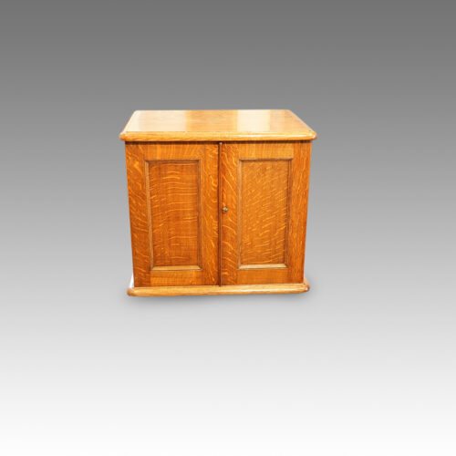 Edwardian oak collectors cabinet