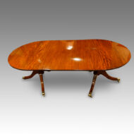 Regency style mahogany twin pillar dining table