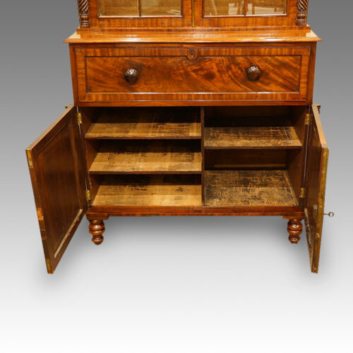 Interior of cupboard on Antique bookcase
