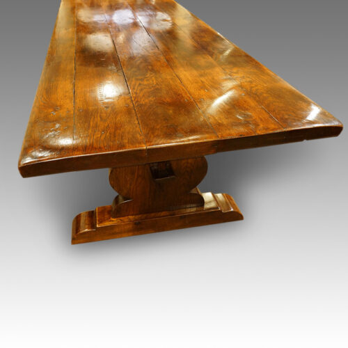 Large oak refectory dining table end view