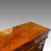 Antique mahogany chiffonier top surface