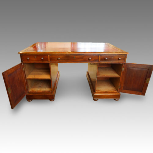 Early Victorian mahogany partners desk doors open