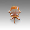 Edwardian oak spindle back revolving desk chair