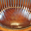 Edwardian oak spindle back revolving desk chair leather seat