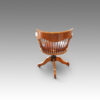 Edwardian oak spindle back revolving desk chair rear view