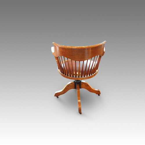 Edwardian oak spindle back revolving desk chair rear view
