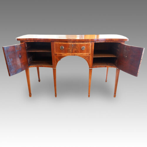 Georgian serpentine mahogany inlaid sideboard doors open
