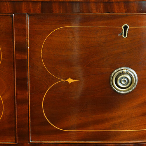 Regency inlaid mahogany D shape chest of drawers handle detail