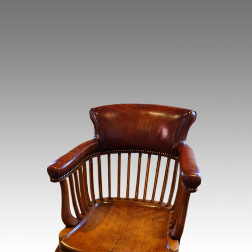 Edwardian oak and leather desk chair, back slats
