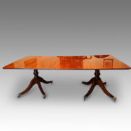 Regency style twin pillar mahogany dining table with line inlay side