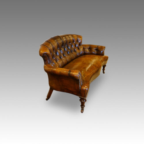 Victorian small leather settee end view