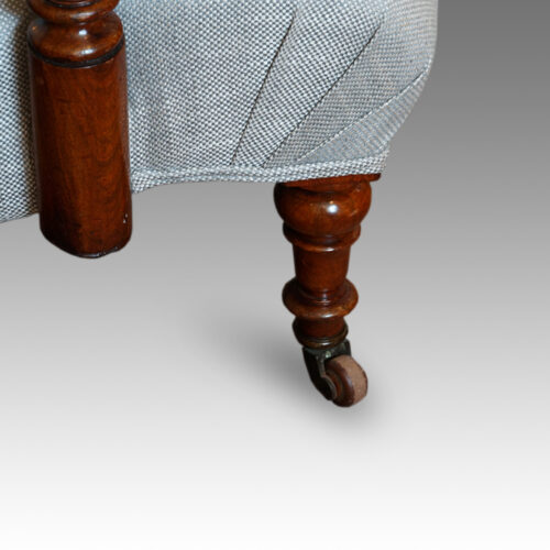 Victorian walnut library easy chair front leg