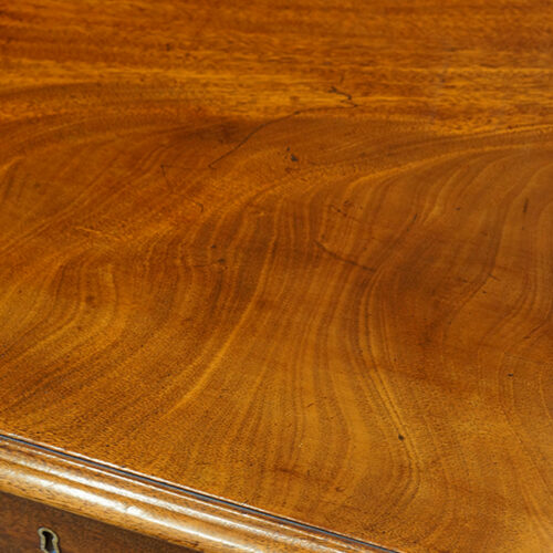 Antique mahogany small chest of drawers top detail