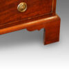 Antique mahogany small chest of drawers leg