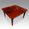 George IV mahogany extending dining table closed