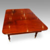 George IV mahogany extending dining table detail