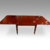 George IV mahogany extending dining table side