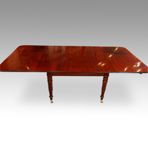 George IV mahogany extending dining table side