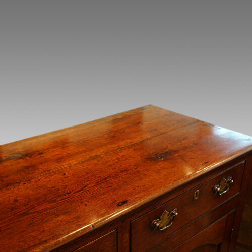 Georgian oak dresser with central drawers top