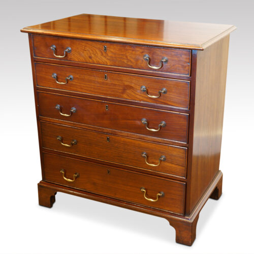 Late Georgian mahogany small chest of drawers at angle