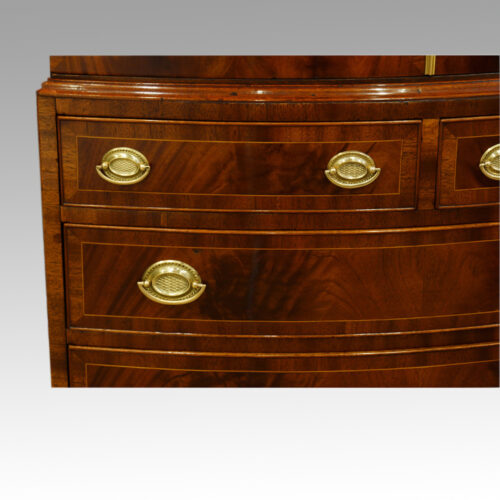 Mahogany bow front small linen press drawer detail