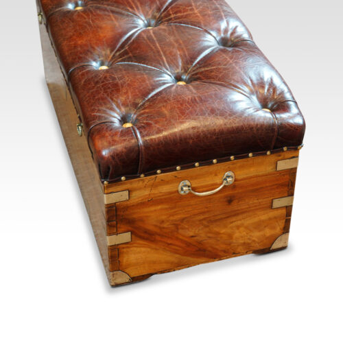 Victorian camphorwood and leather ottoman end view