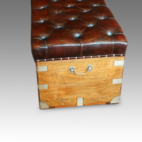 Victorian camphorwood and leather ottoman end view