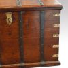 Antique teak trunk with iron straps and brass corners detail