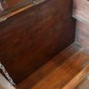 Antique teak trunk with iron straps and brass corners interior