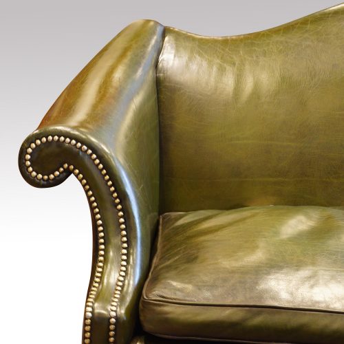 Camel back Chippendale style sofa scroll arm detail