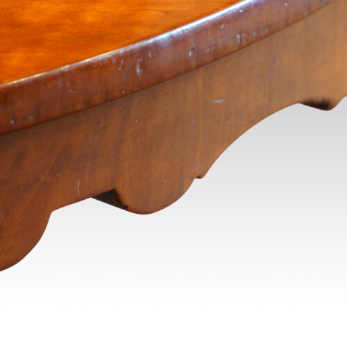 Circular mahogany coffee table apron