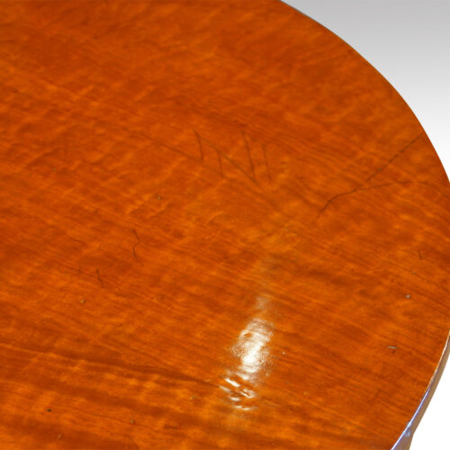Circular mahogany coffee table detail