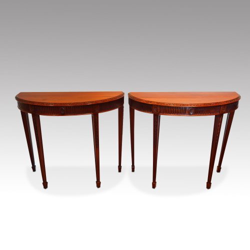 Edwardian pair of mahogany demi lune console tables