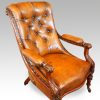 Pair of William IV mahogany library chairs angle view