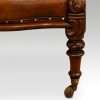 Pair of William IV mahogany library chairs leg