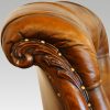 Pair of William IV mahogany library chairs top carving