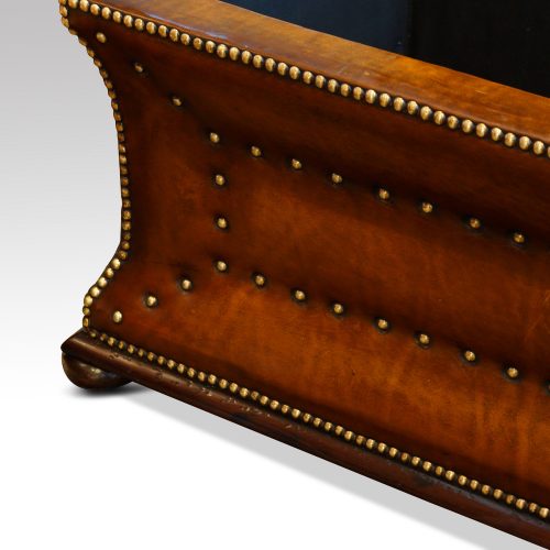 Victorian shaped leather Ottoman bun foot