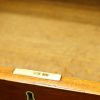 Antique mahogany linen press drawer lining