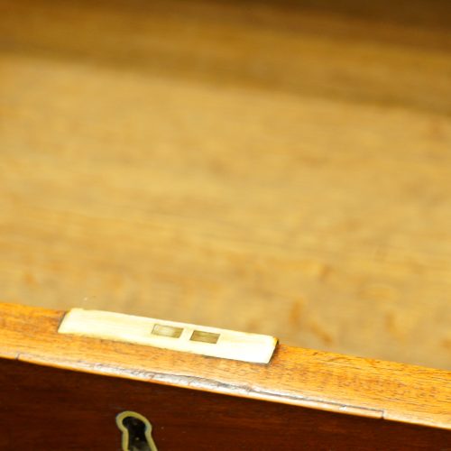 Antique mahogany linen press drawer lining