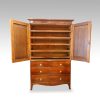 Antique mahogany linen press interior