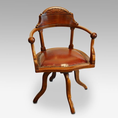 Edwardian mahogany ball arm revolving desk chair