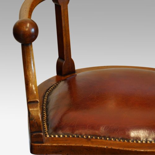 Edwardian mahogany ball arm revolving desk chair arm