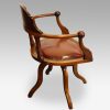 Edwardian mahogany ball arm revolving desk chair side