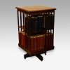 Edwardian mahogany revolving bookcase with books