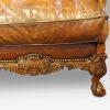 Edwardian walnut bergere sofa carved apron